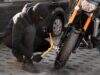 close-up-man-preparing-steal-motorcycle-2